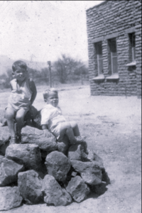 Image of Dan and Jim Reidy in Front of House