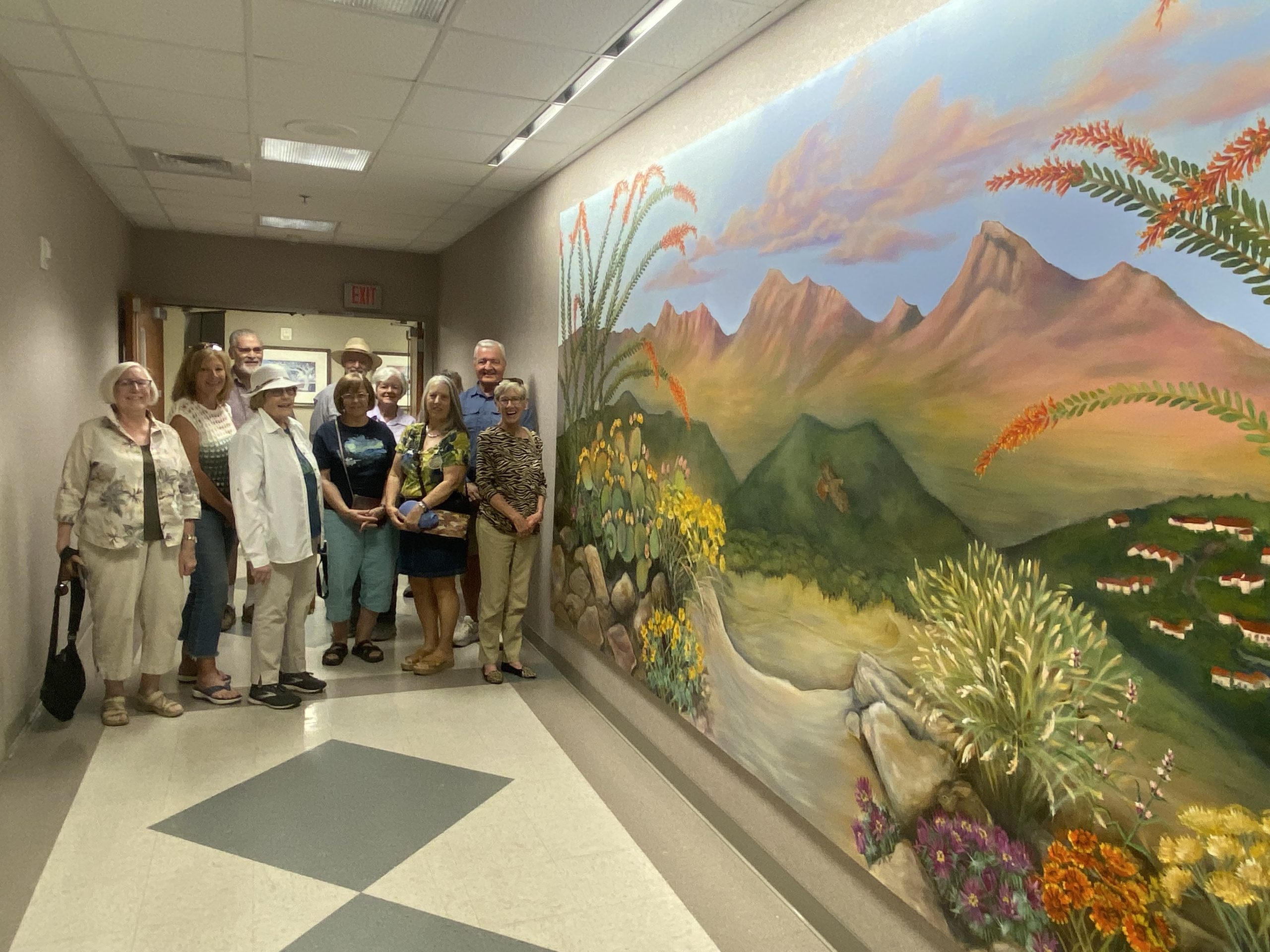 Group of OVHS Volunteers Standing by Gail Munden's Mural, At the End of the Day