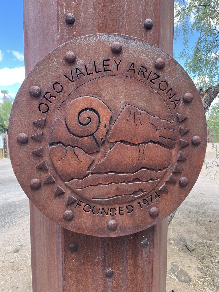 Steam Pump Ranch Iron Entrance Sign with Oro Valley Logo