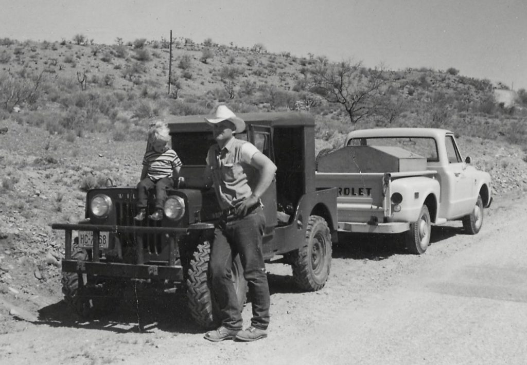 Butch and daughter, Leslie, relaxing on a Willys Jeep.
