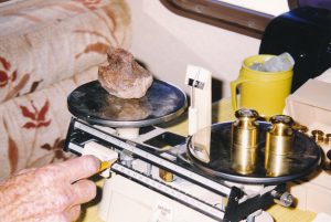 Weighing a Meteorite at Gold Basin Dig, c. 1996-1998