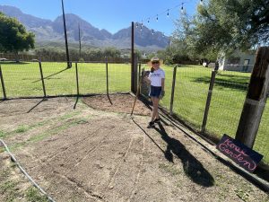 Woman standing in dirt area for new rose garden at United Way Days of Caring at Heritage_October 2025