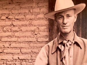 Jack Procter in Cowboy Hat and western shirt, tie and vest