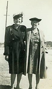 Mabel Pusch-Hankins and Gertrude Pusch-Zipf wearing long coats and hats