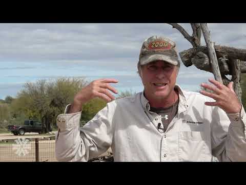 Allen Denoyer with a baseball cap Outside of Pithouse at Steam Pump Ranch