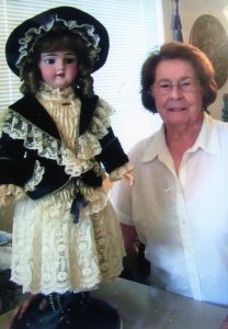 Ruth Fahden with a Ceramic doll named Tootsie