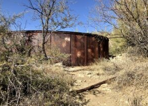 Round rusted Bar G Ranch Holding Tanks near Garwood Dam in Saguaro National Park